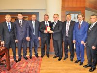 MHP Karatay İlçe Teşkilatı Başkan Hançerli’ye Plaket Takdim Etti